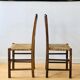 Paire de chaises rustiques en bois et assises paillées