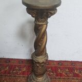 Twisted saddle column in gilded plaster