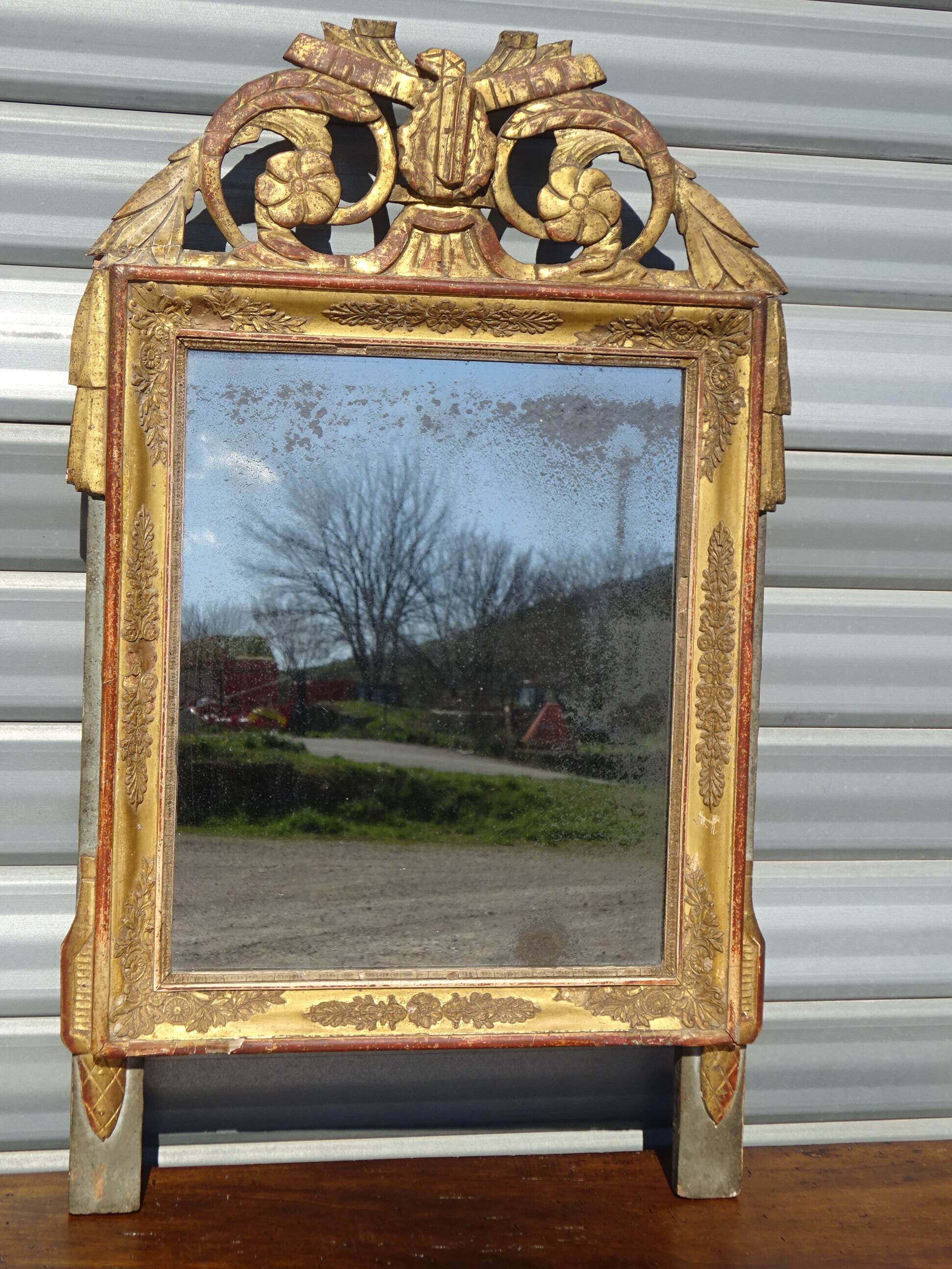 Very old Louis XVI style mirror.