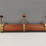 Danish teak and brass coat rack with adjustable hooks, 1960s.