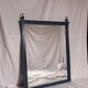 Restored vintage mirror in navy blue, Louis XVI style.