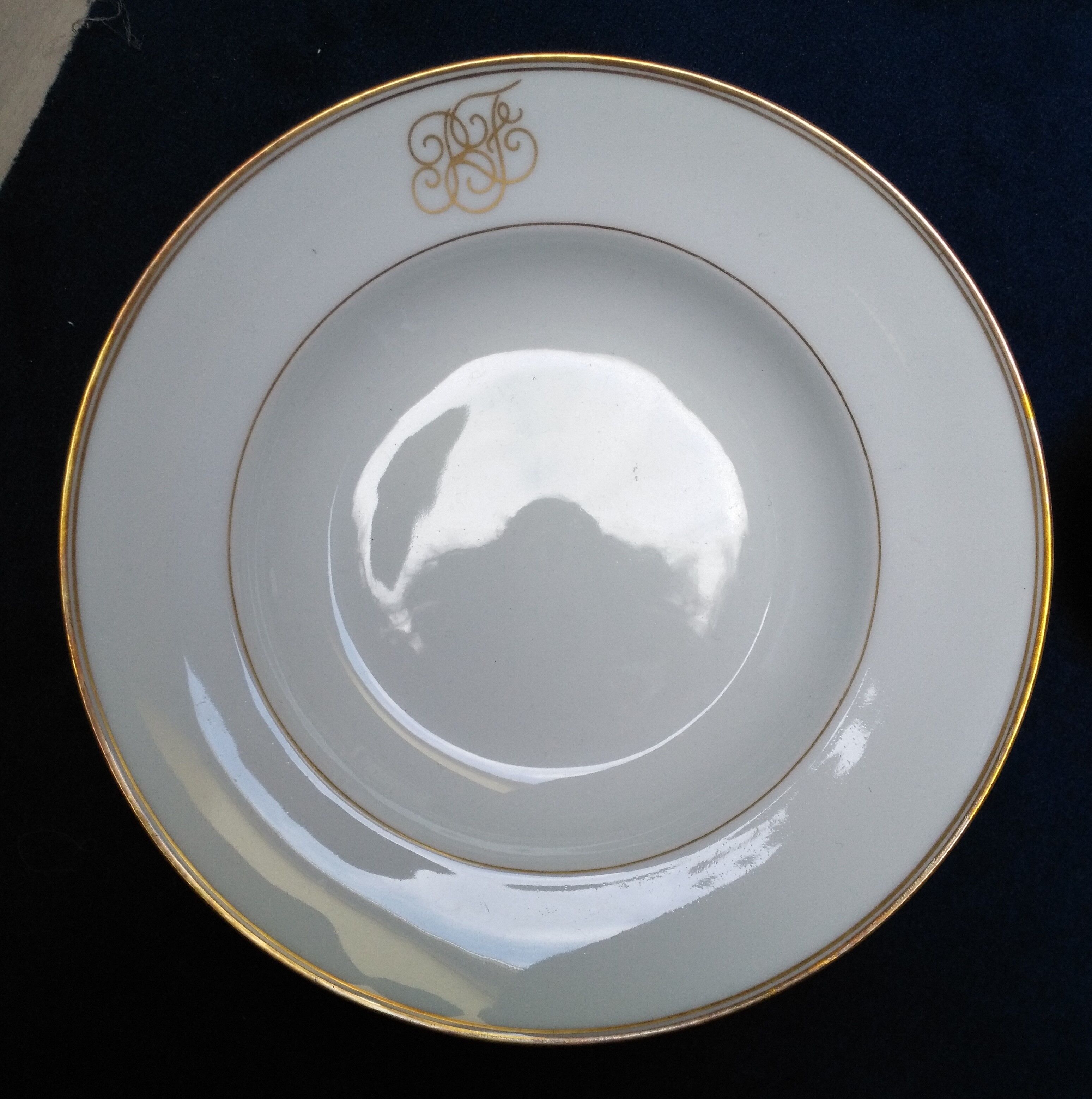 12 porcelain hollow plates of Limoges gold fillet and monogram