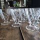 Set of 9 conical glasses on pedestal in antique chiseled glass crosses