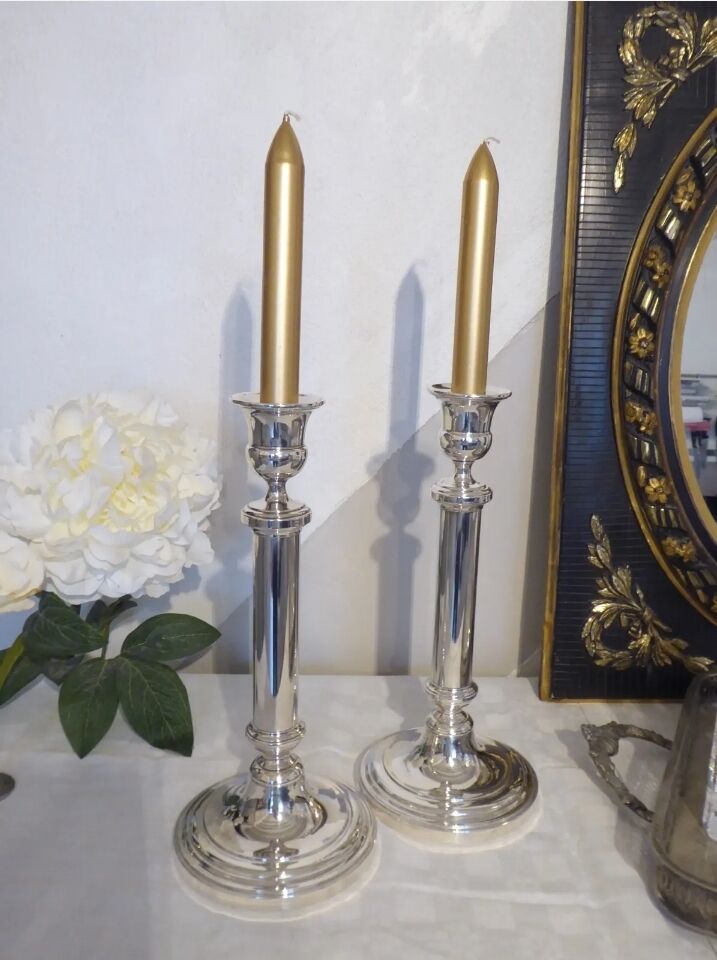 Pair of silver metal candle holders
