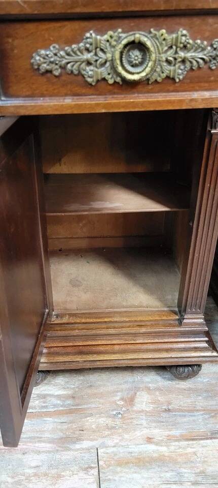Pair of Renaissance style bedside tables in carved walnut, 19th century