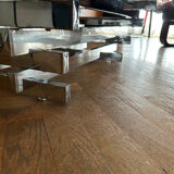 70s design coffee table in rectangular glass with chrome legs.