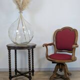 Vintage captain's chair in wood and garnet fabric — a seat with character