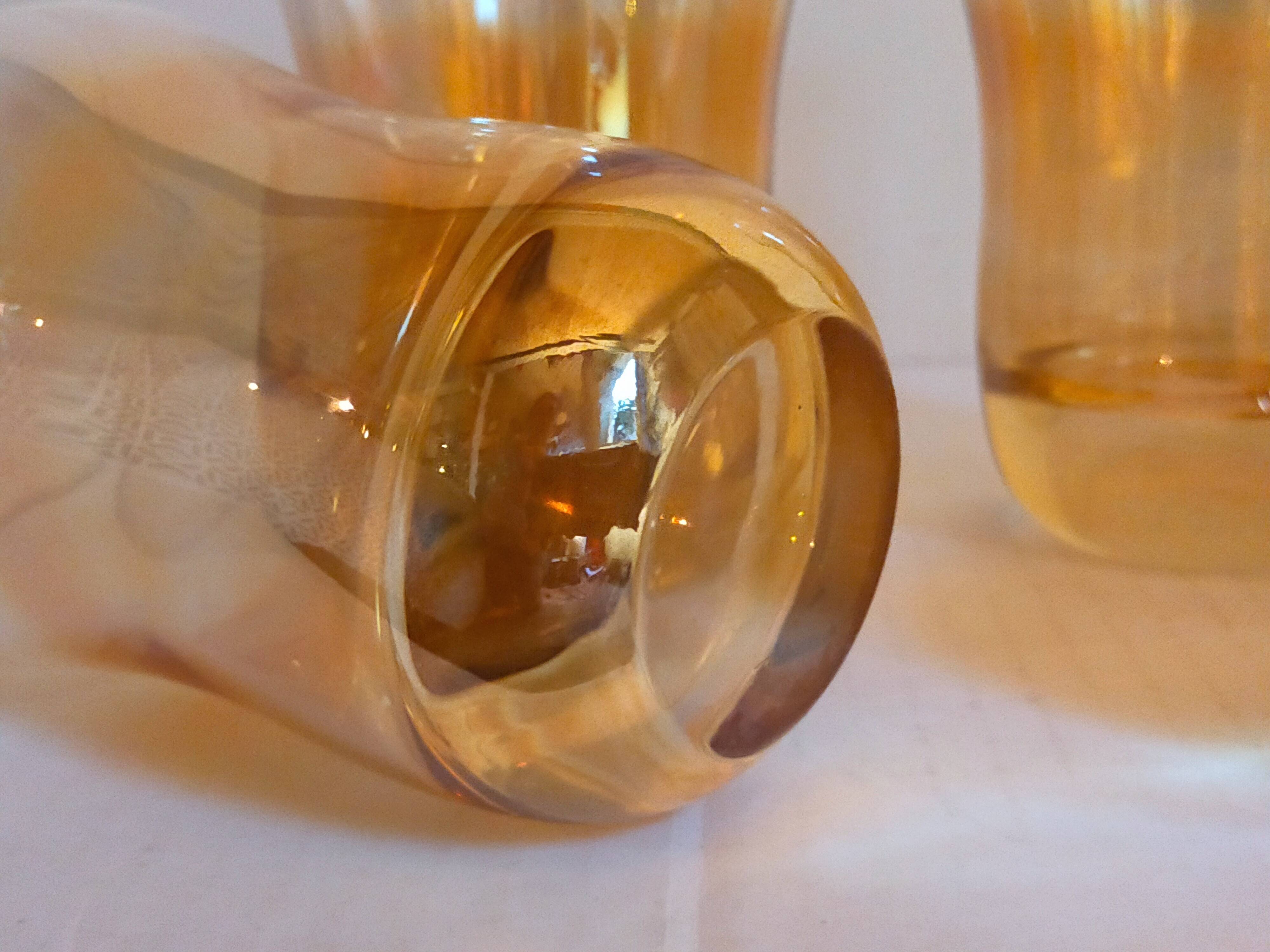 Four iridescent honey blown glass glasses