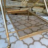 Golden dessert with wheeled glass tray