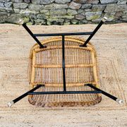 Fauteuil en rotin et piétement en métal noir 1960