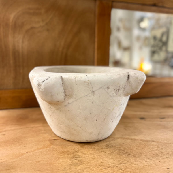 Old white grey marble mortar