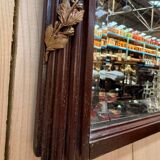 Louis XVI style mirror in mahogany and gold.