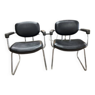 Pair of armchairs in black skai and chrome steel vintage design