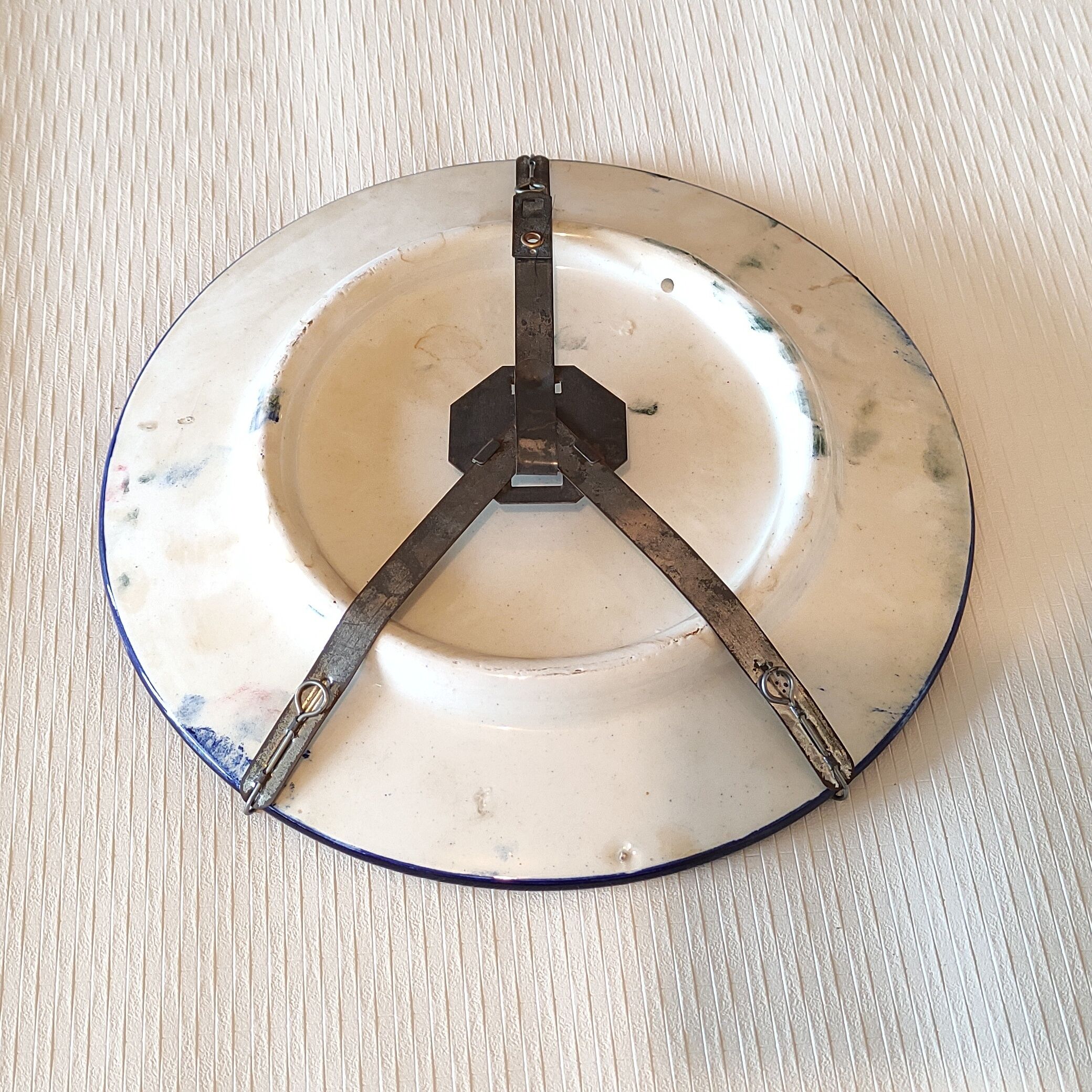 Hand-painted decorative plate decorated with a blue chimera pattern