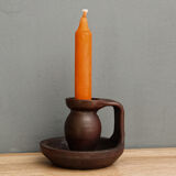 Small hand-held candlestick, signed