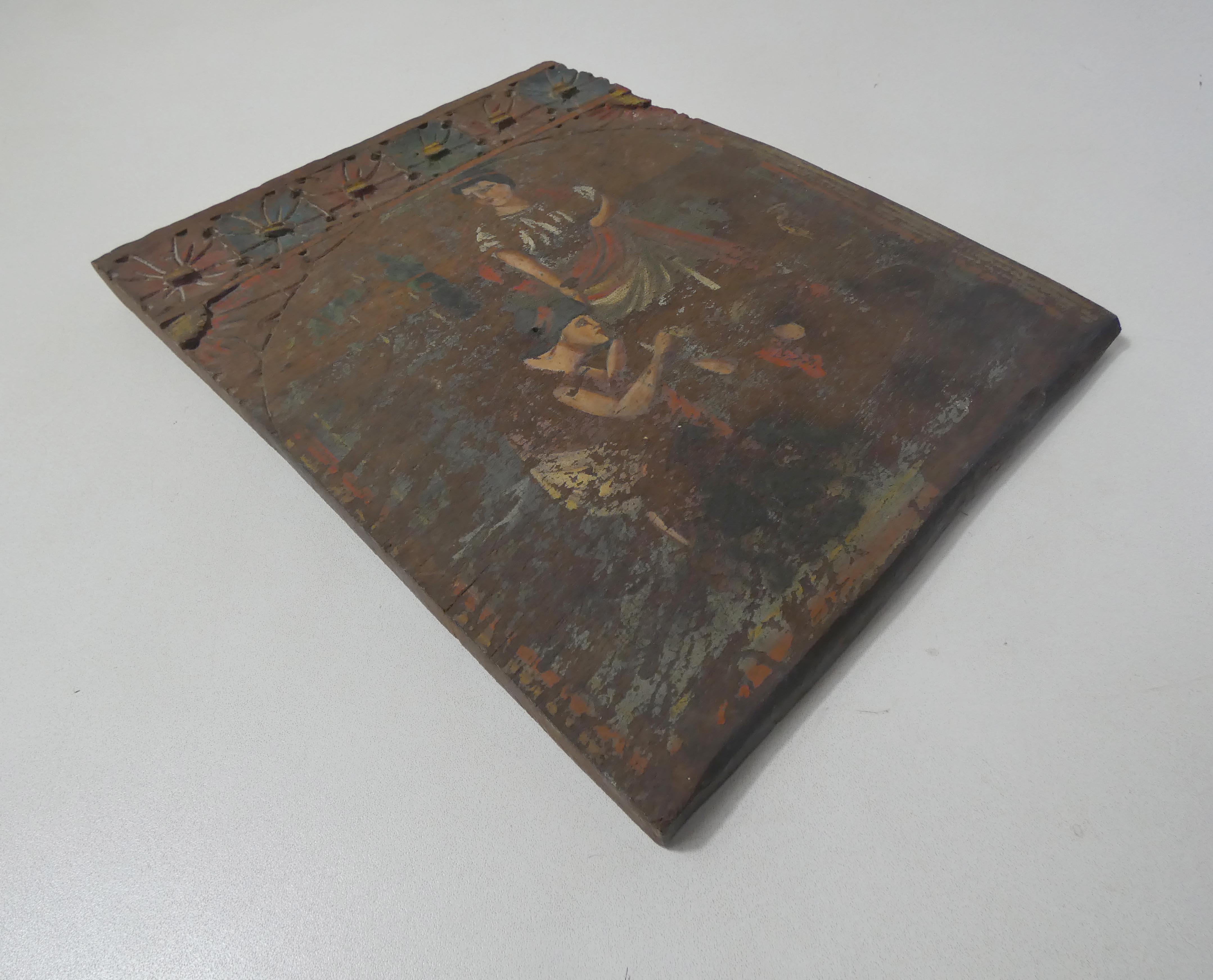 Painting on carved wood panel