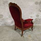 Walnut and velvet armchair