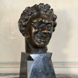 Head of a faun smiling, bronze after the antique, 19th century.