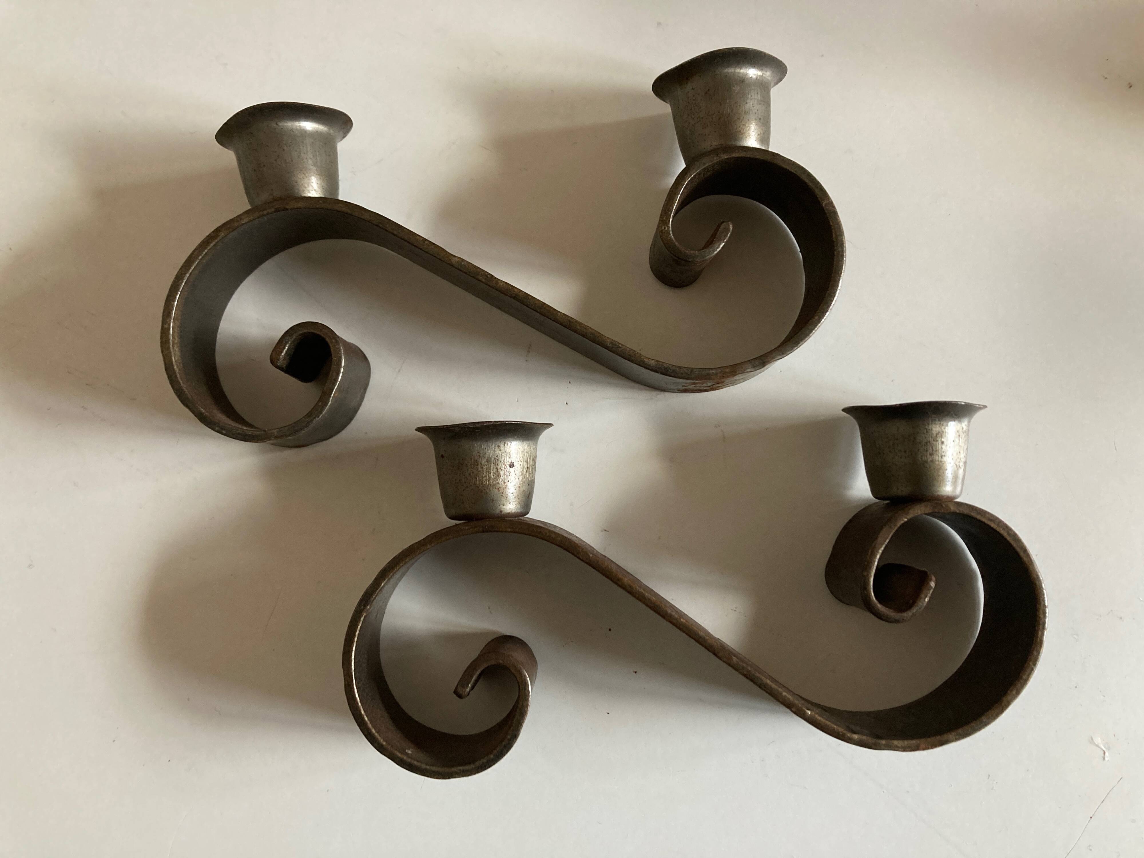 Pair of corrugated wrought iron candlesticks 1950