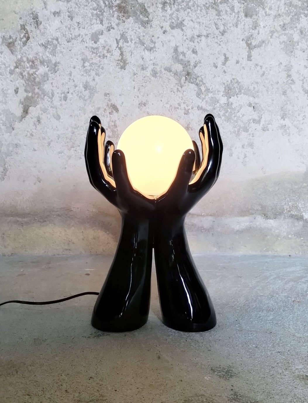 Black and white opaline hand lamp.