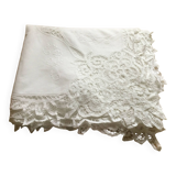 Embroidered white tablecloth and lace