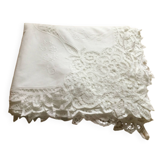 Embroidered white tablecloth and lace
