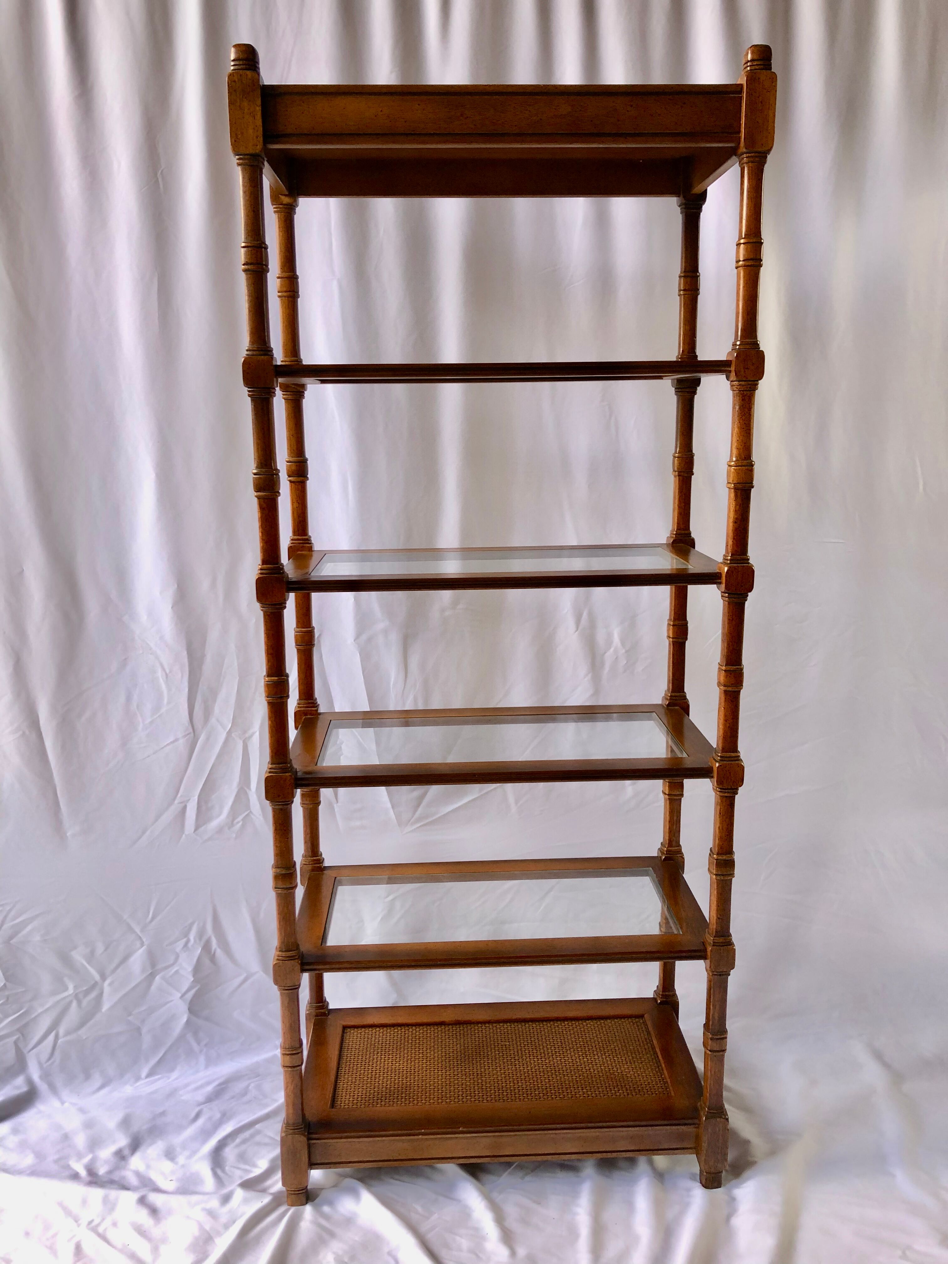 Classic wooden shelves, glass tops and cannage
