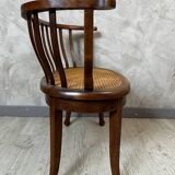 Caned armchair
