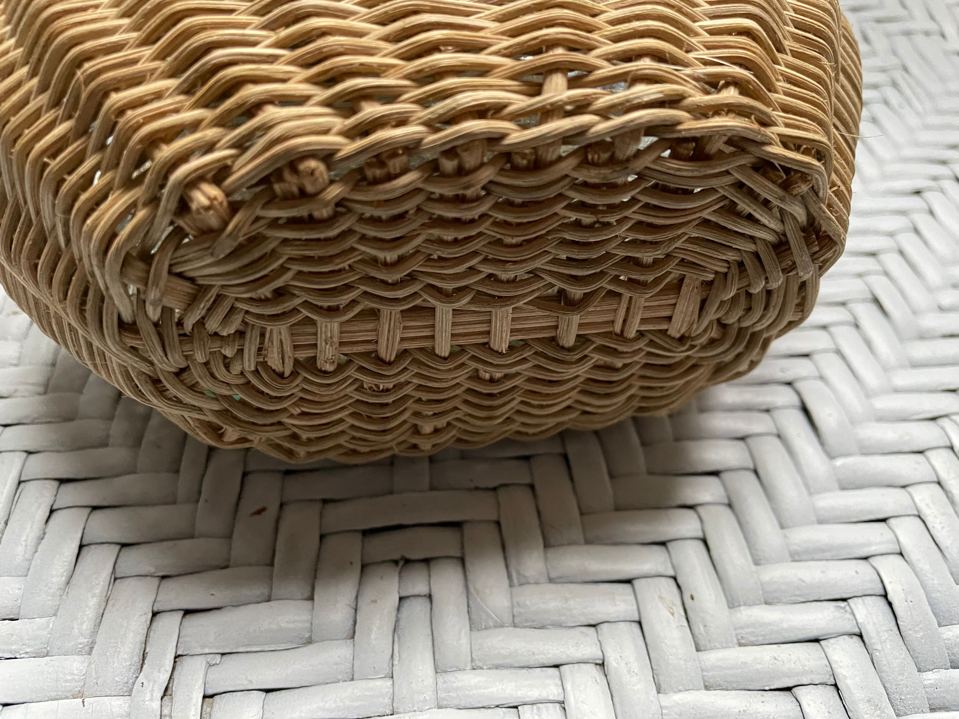 Wicker-sheathed glass bottle