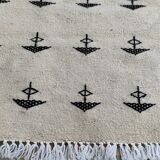 White and black carpet with berber patterns hand-woven in natural wool