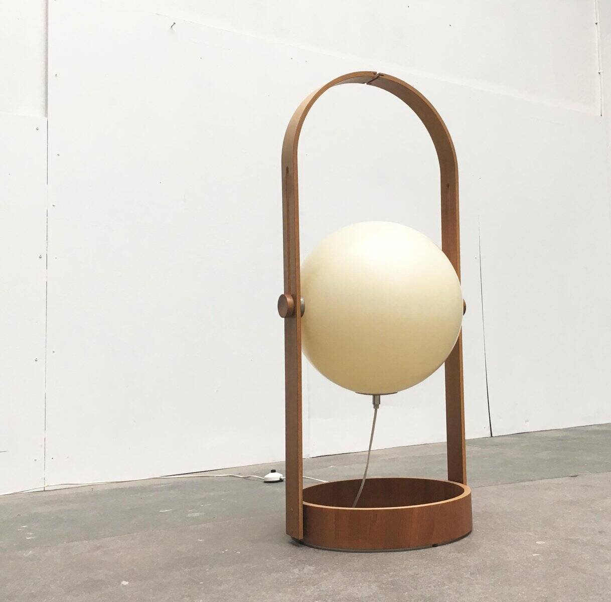 Swiss space-style floor lamp made of plastic and plywood from the 1960s.
