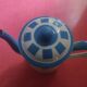 White enamelled sheet metal coffee maker with blue checkered Lustucru style stamped Duco