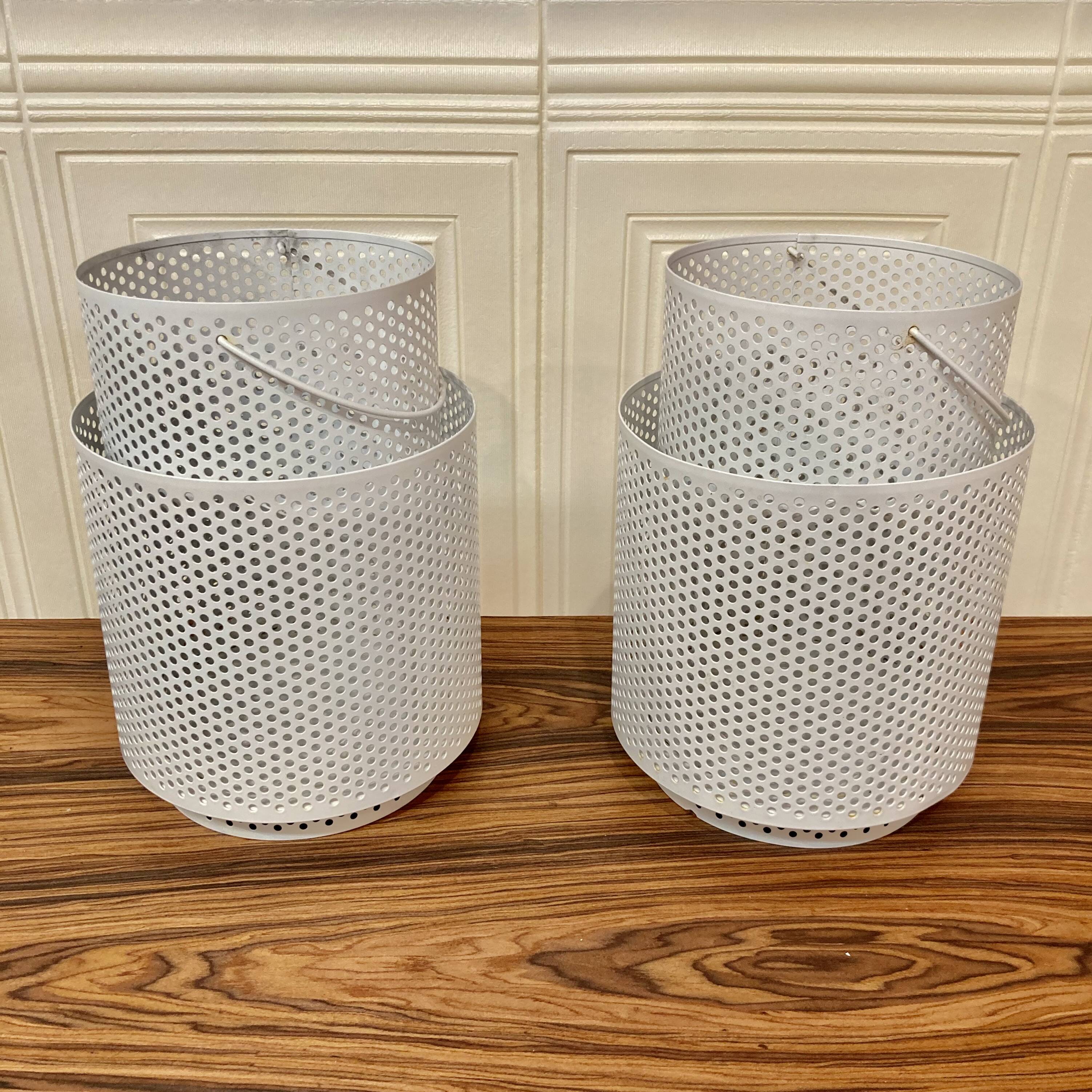 Set of 2 large metal candle holders in scandinavian design.