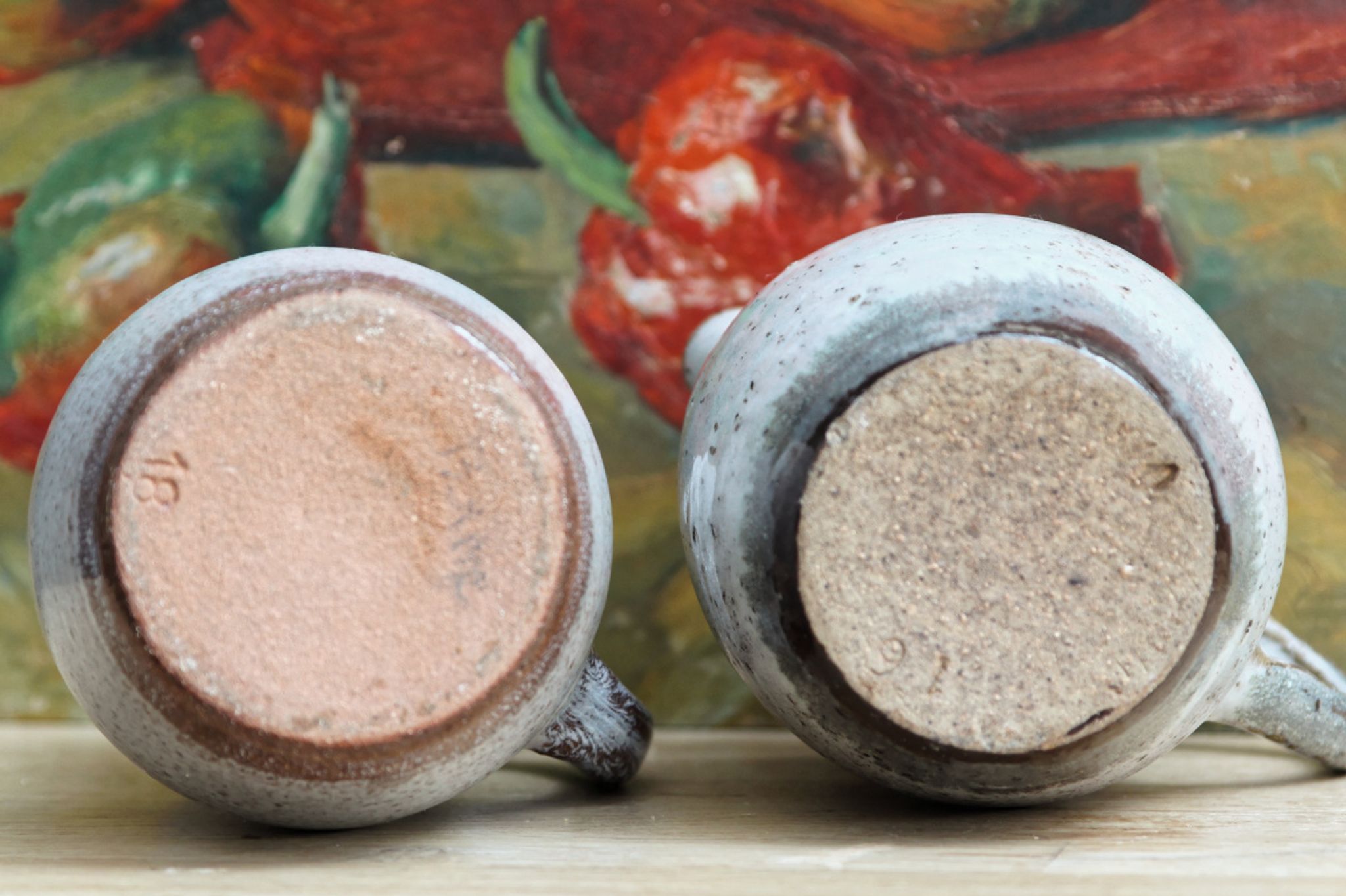 Pair of glazed terracotta pitchers