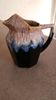 antique enamelled ceramic jug