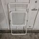 Perforated metal folding chair