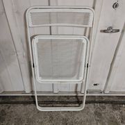Perforated metal folding chair