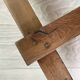 Solid wood workshop table with straight legs.