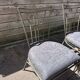 6 wrought iron chairs with fabric seats