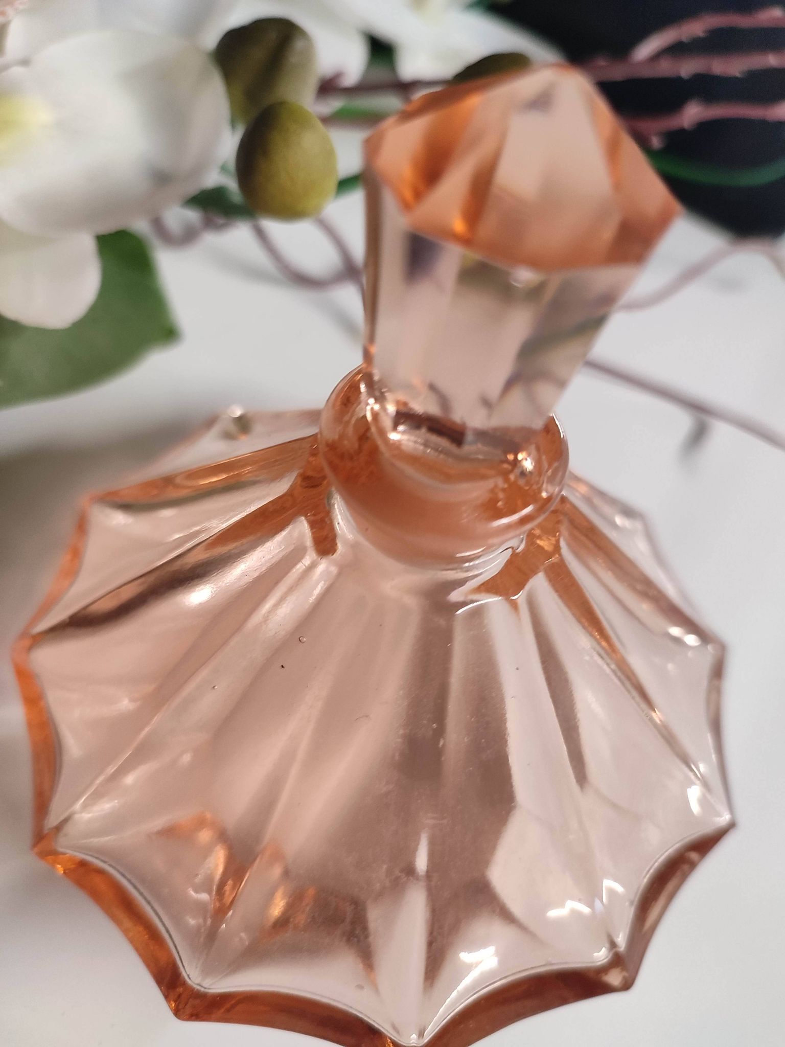 Vintage Art Deco perfume bottle in beautiful pink glass.