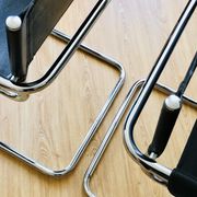 Pair of tubular armchairs in metal and leather Style Marcel Breuer