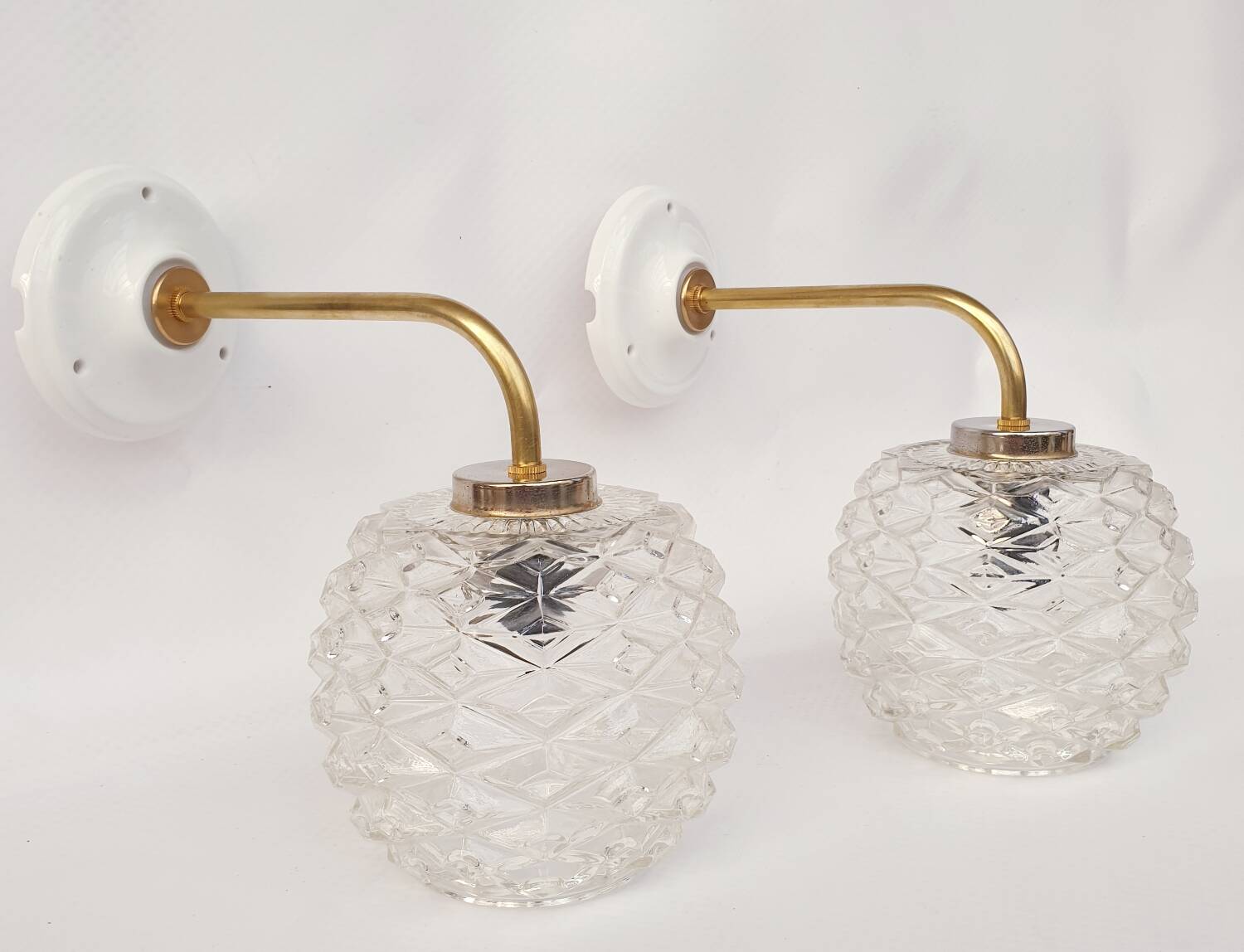 Swan neck and glass wall lights