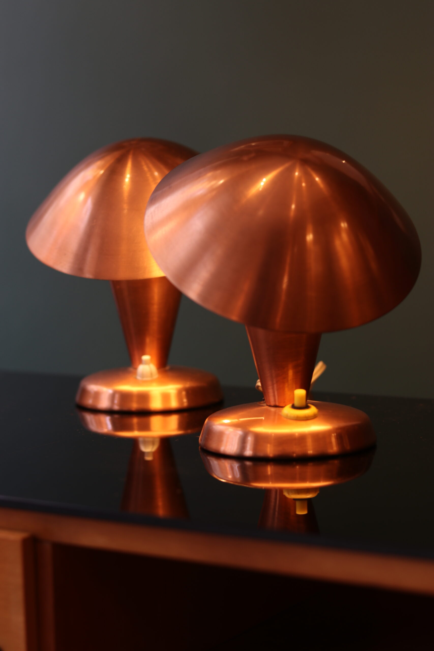 Pair of Bauhaus style mushroom lamps in copper metal.