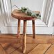 Tripod stool in raw wood