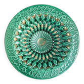 Large pierced earthenware fruit bowl glazed in green and gold.