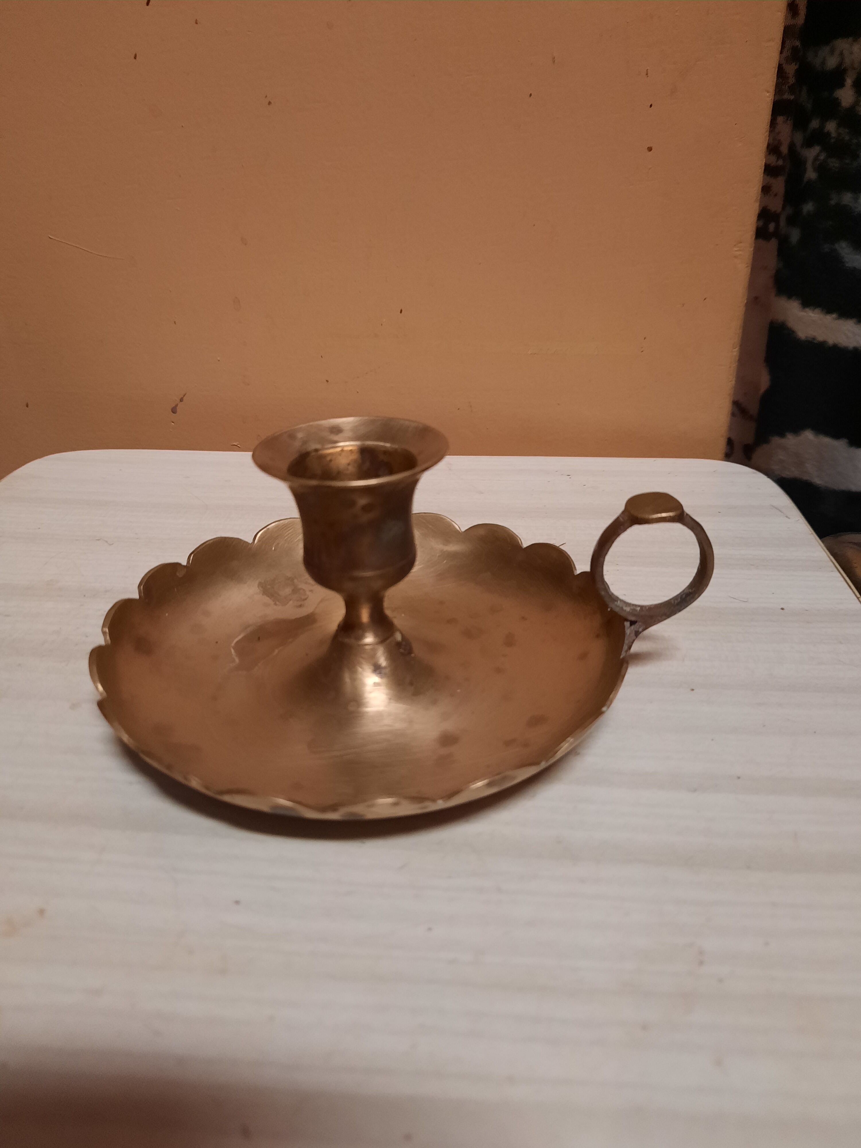 Golden hand candle holder