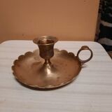 Golden hand candle holder