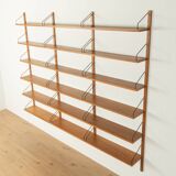 Classic wall shelf by Poul Cadovius for Cado, 1950s, teak veneer, 18 shelves, 4 ladders, Denmark
