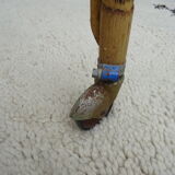 Rattan bassinet on folding support