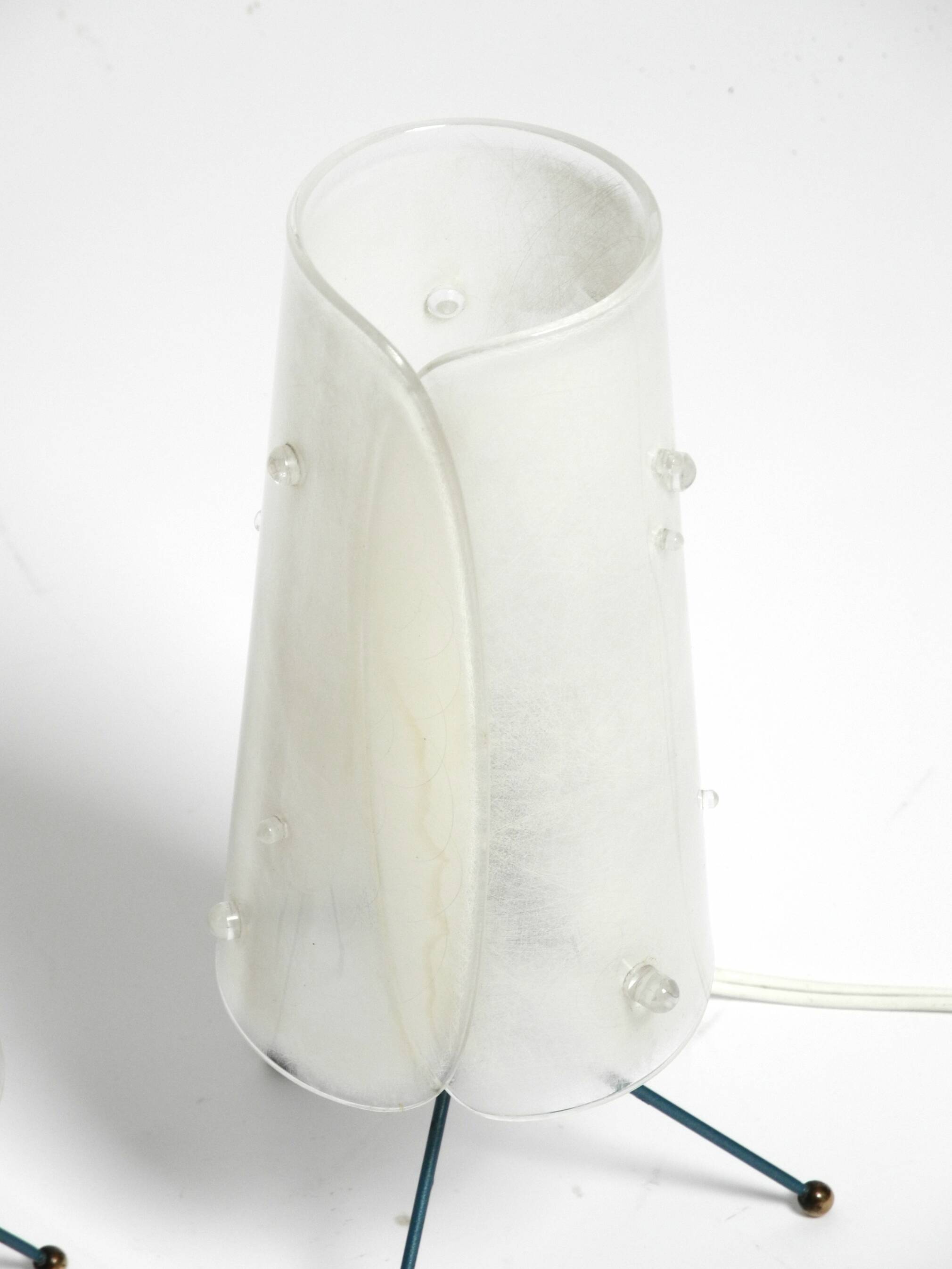 Two very Mid Century Modern tripod table lamps with white plexiglas shades